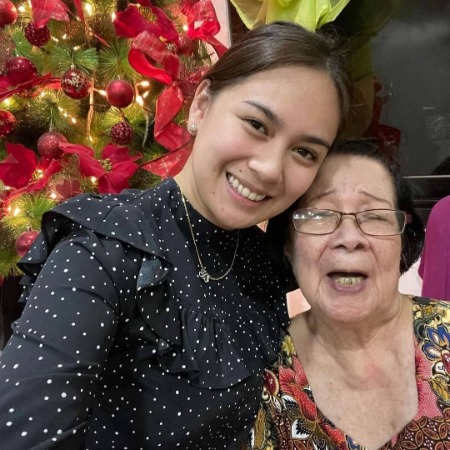 Yen Santos with her loving grandmother.